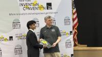 Matthew Ponnaiya being awarded his Silver at the New York Invention Convention